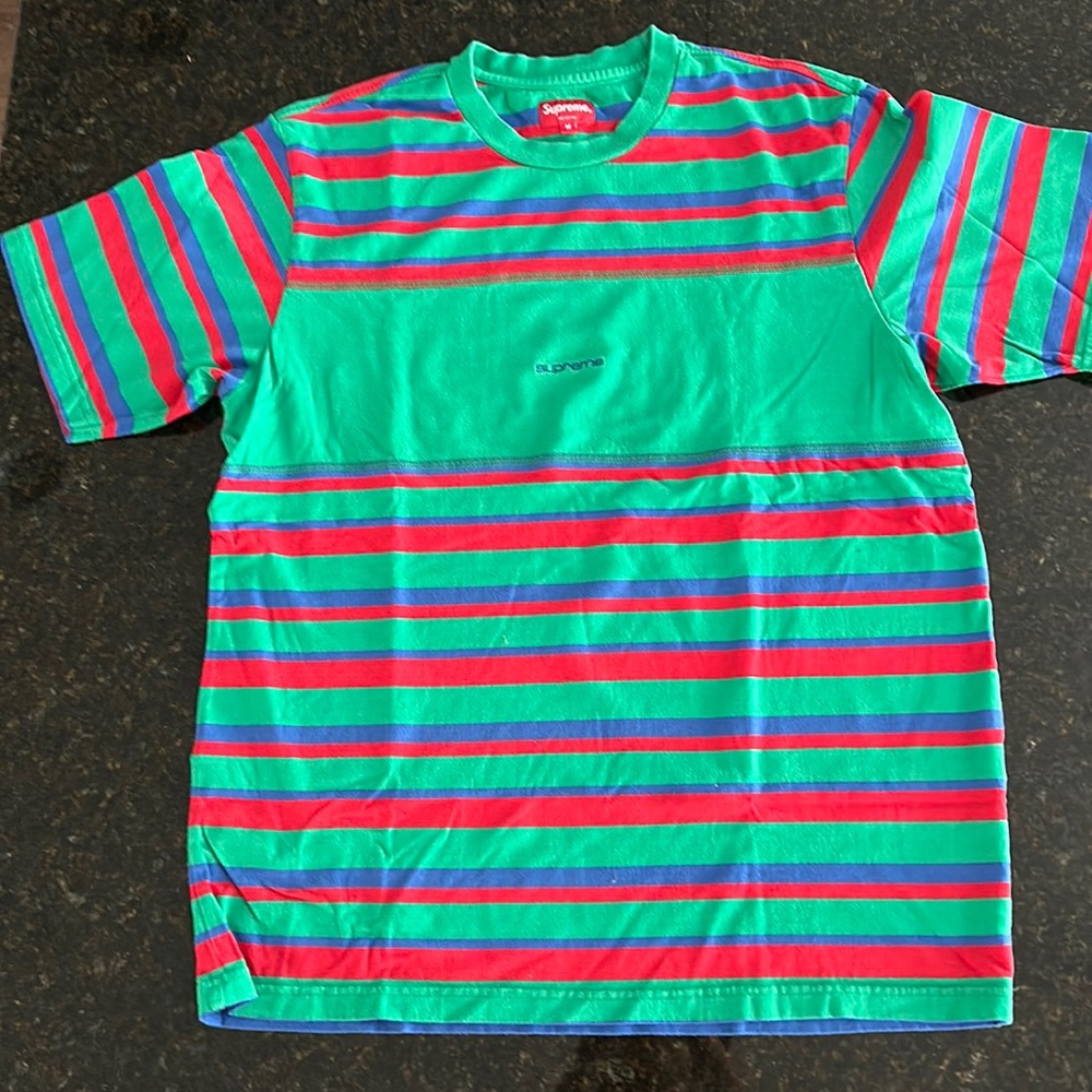 Supreme green, blue, and red stripped M size %100 cotton T-shirt.